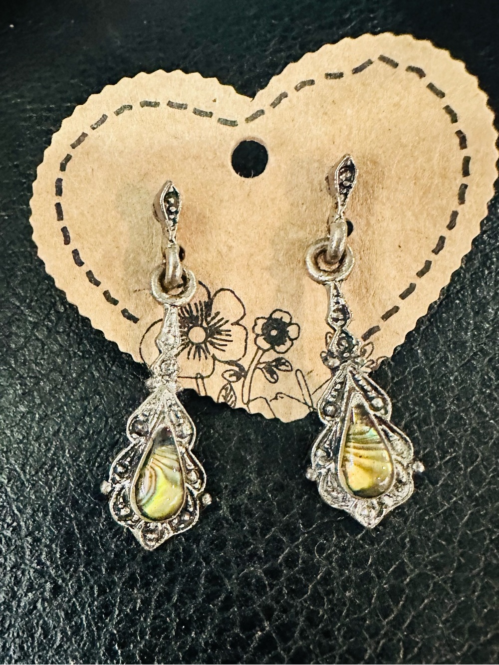 Silver Filigree Teardrop Earrings with Green Iridescent Shell Accent
